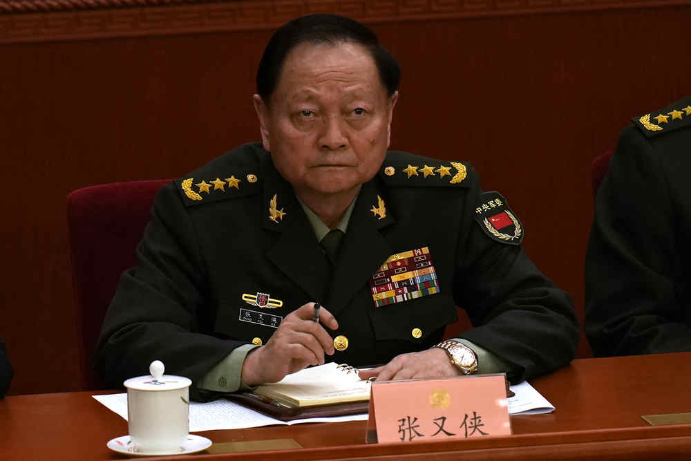 Chinese general takes harsh line on Taiwan and other disputes at international naval gathering