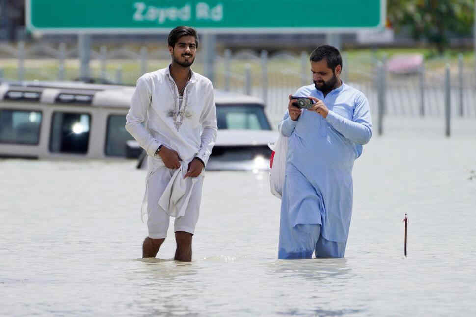 The desert nation of UAE records its most rain ever, flooding highways and Dubai’s airport